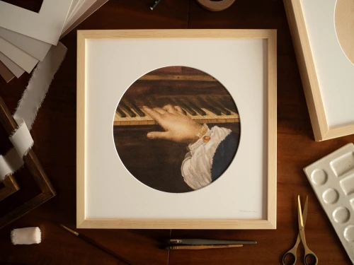 Reprodukcja "Pianino" w passe-partout i drewnianej ramie